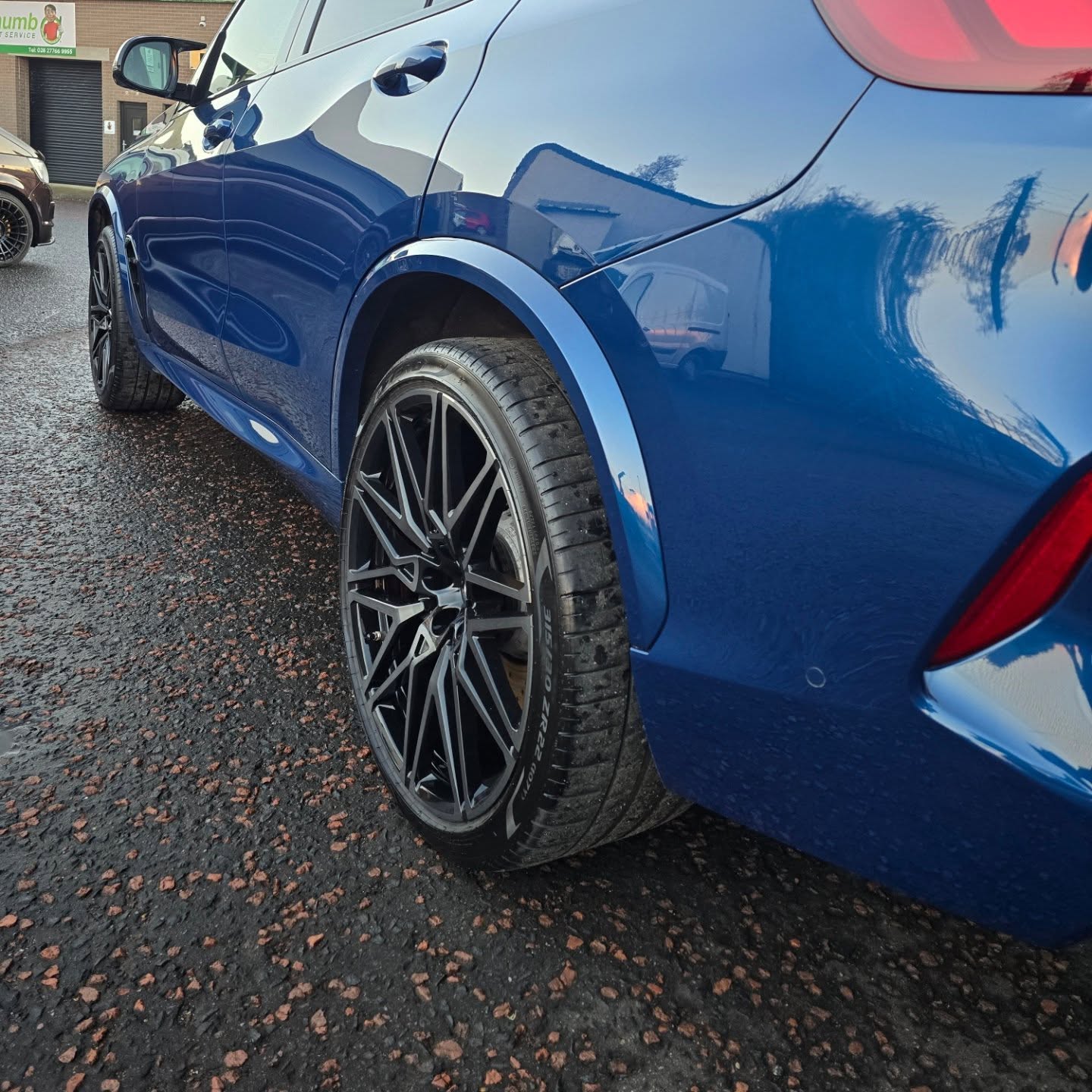 Alloy wheels on blue BMW M5 in Ireland