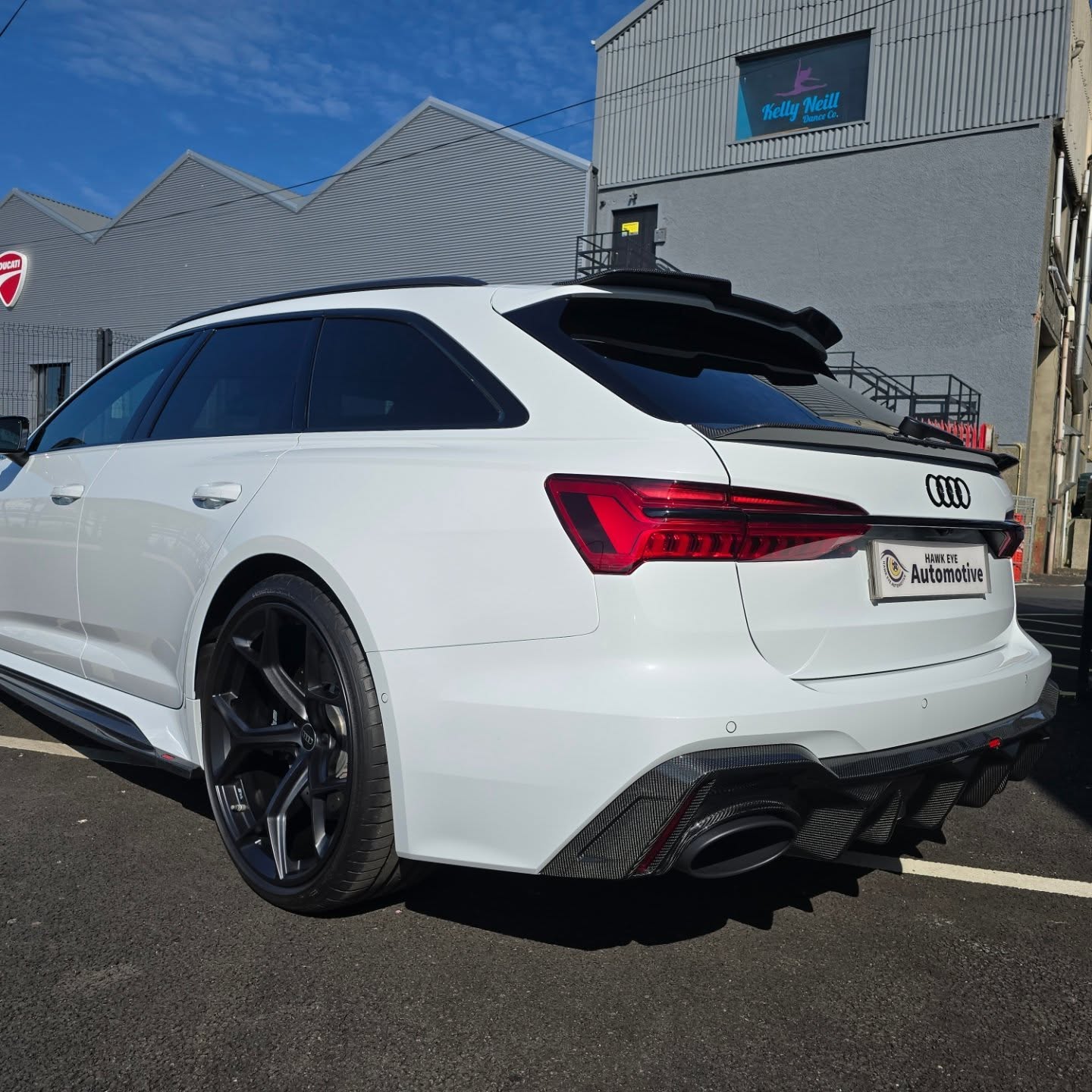 White Audi with rear body kit in Ireland